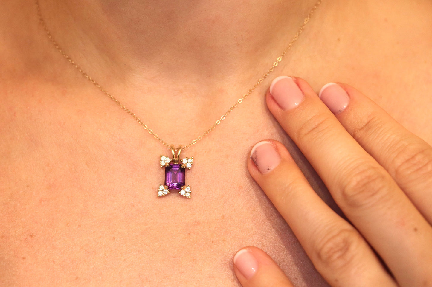 14k Amethyst emerald cut with Diamonds pendant. Diamond cluster star and 16in rolo necklace