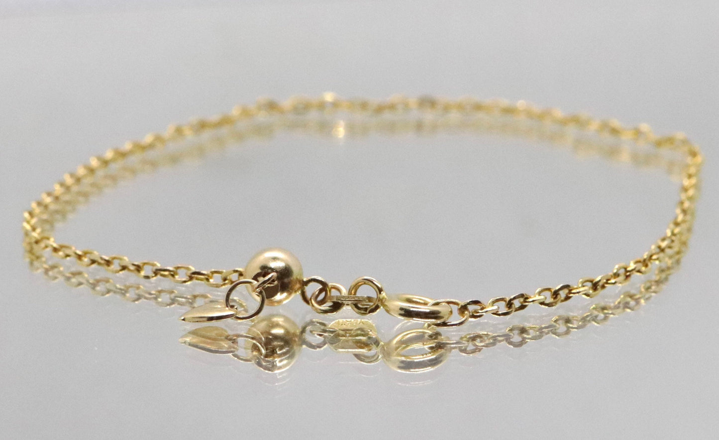 10k Adjustable Slide bracelet. Beautiful heart charm slider slide rolo chain bracelet 8in