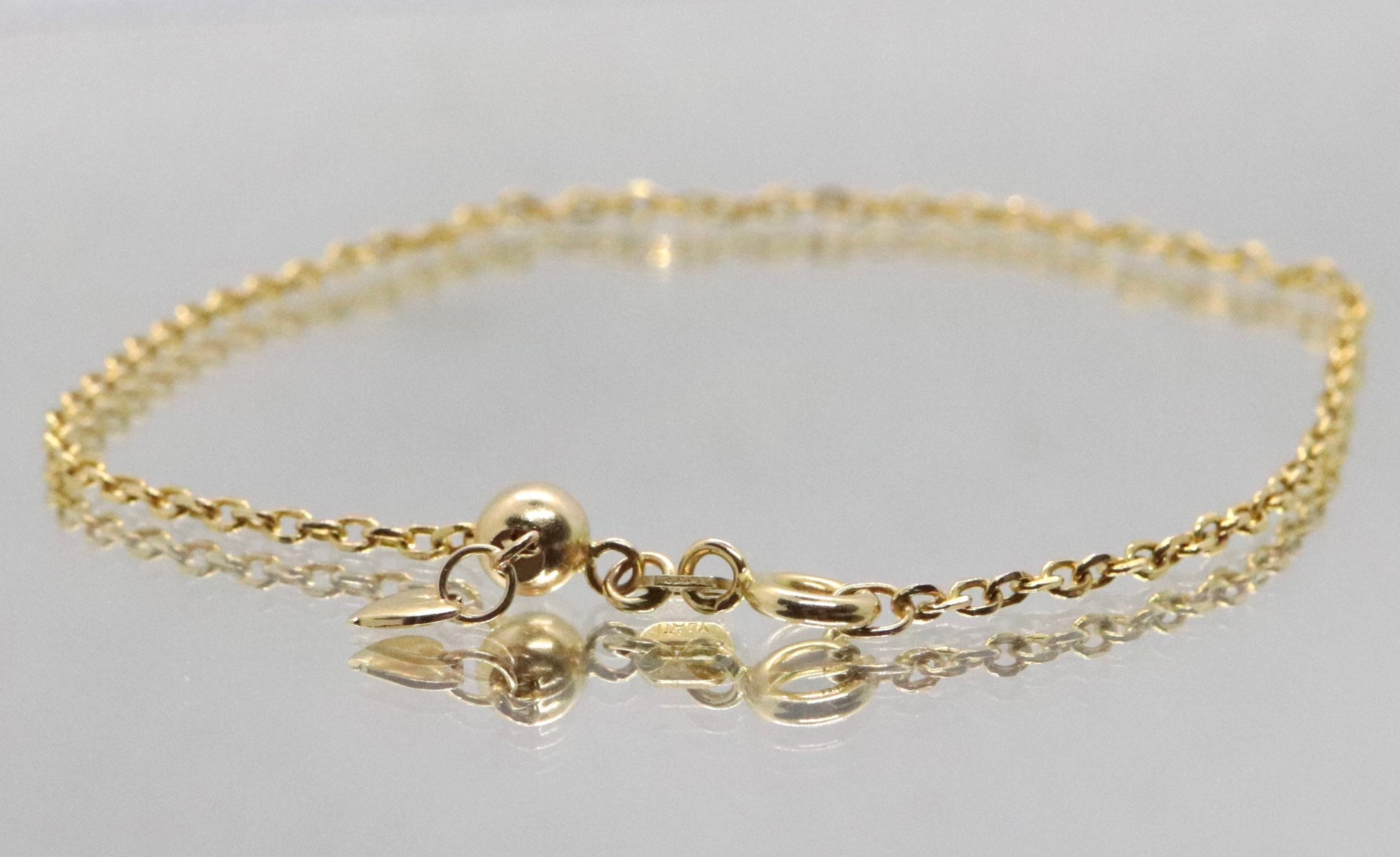 10k Adjustable Slide bracelet. Beautiful heart charm slider slide rolo chain bracelet 8in