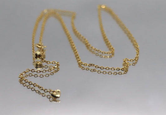 10k Adjustable Slide necklace. Beautiful heart charm with bead slider on oval rolo chain. 23.5in