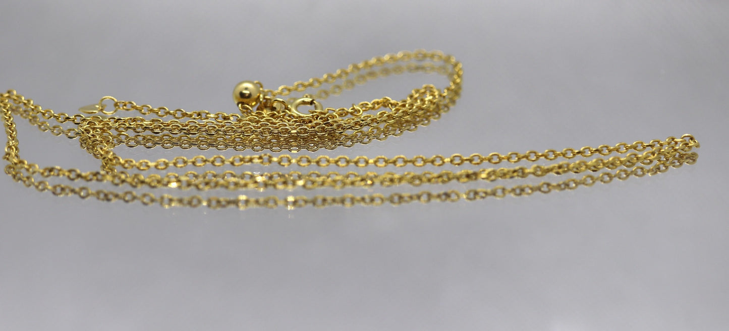 10k Adjustable Slide necklace. Beautiful heart charm with bead slider on oval rolo chain. 23.5in