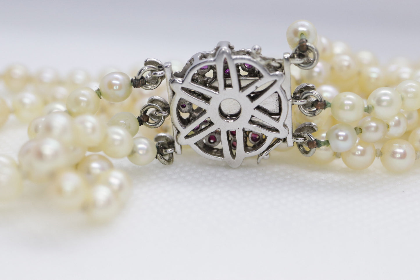 18k Sapphire Ruby Diamond Graduated Saltwater Pearl triple thread necklace.