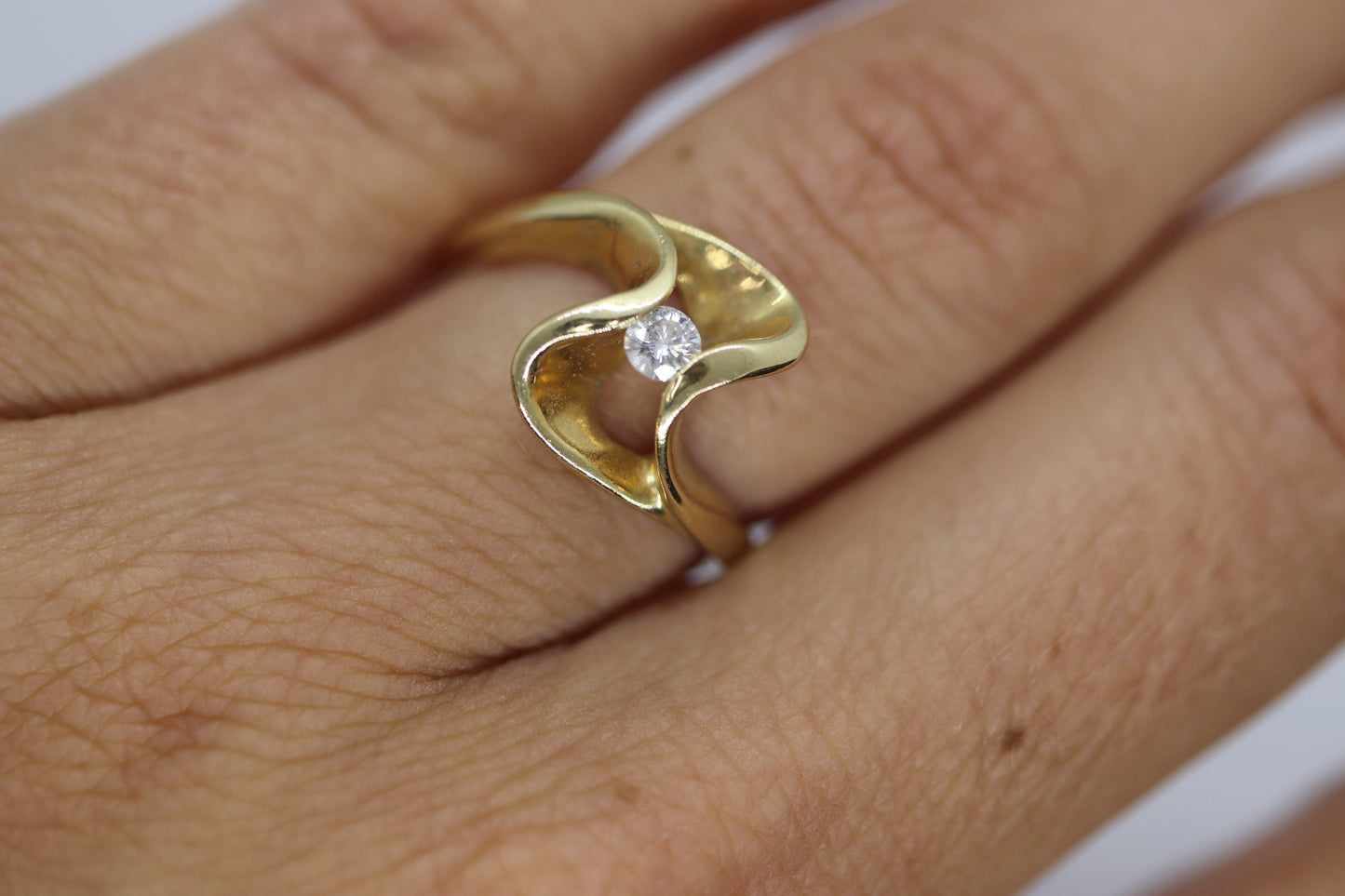 Diamond Tension Ring. 14k Diamond Solitaire Swirl Swivel ring.