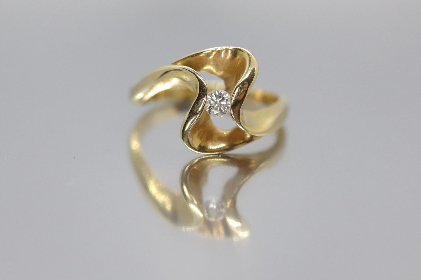 Diamond Tension Ring. 14k Diamond Solitaire Swirl Swivel ring.