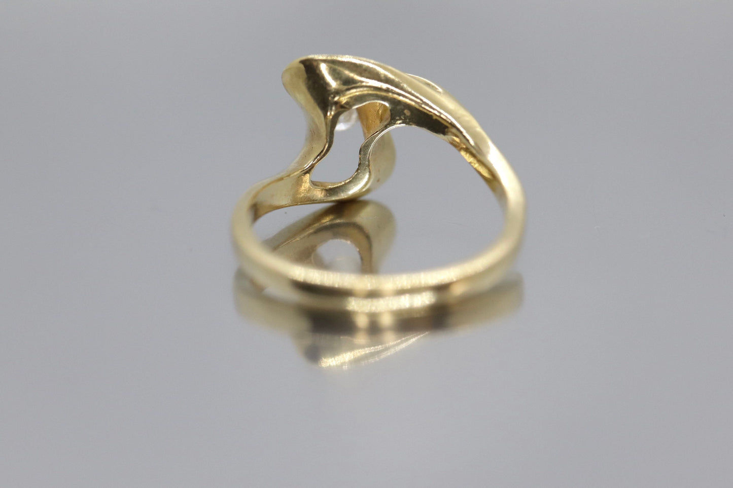 Diamond Tension Ring. 14k Diamond Solitaire Swirl Swivel ring.