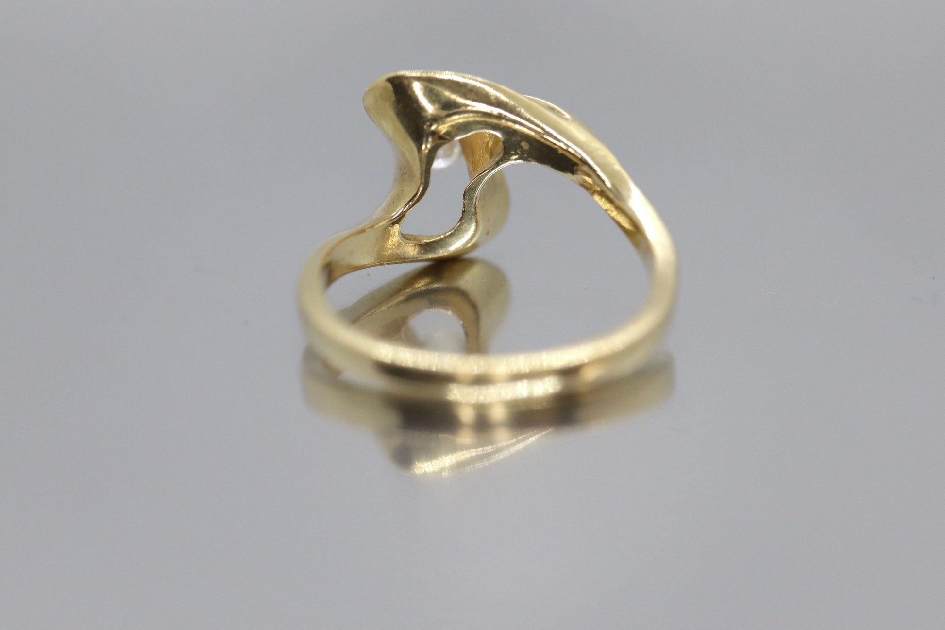 Diamond Tension Ring. 14k Diamond Solitaire Swirl  Swivel ring.