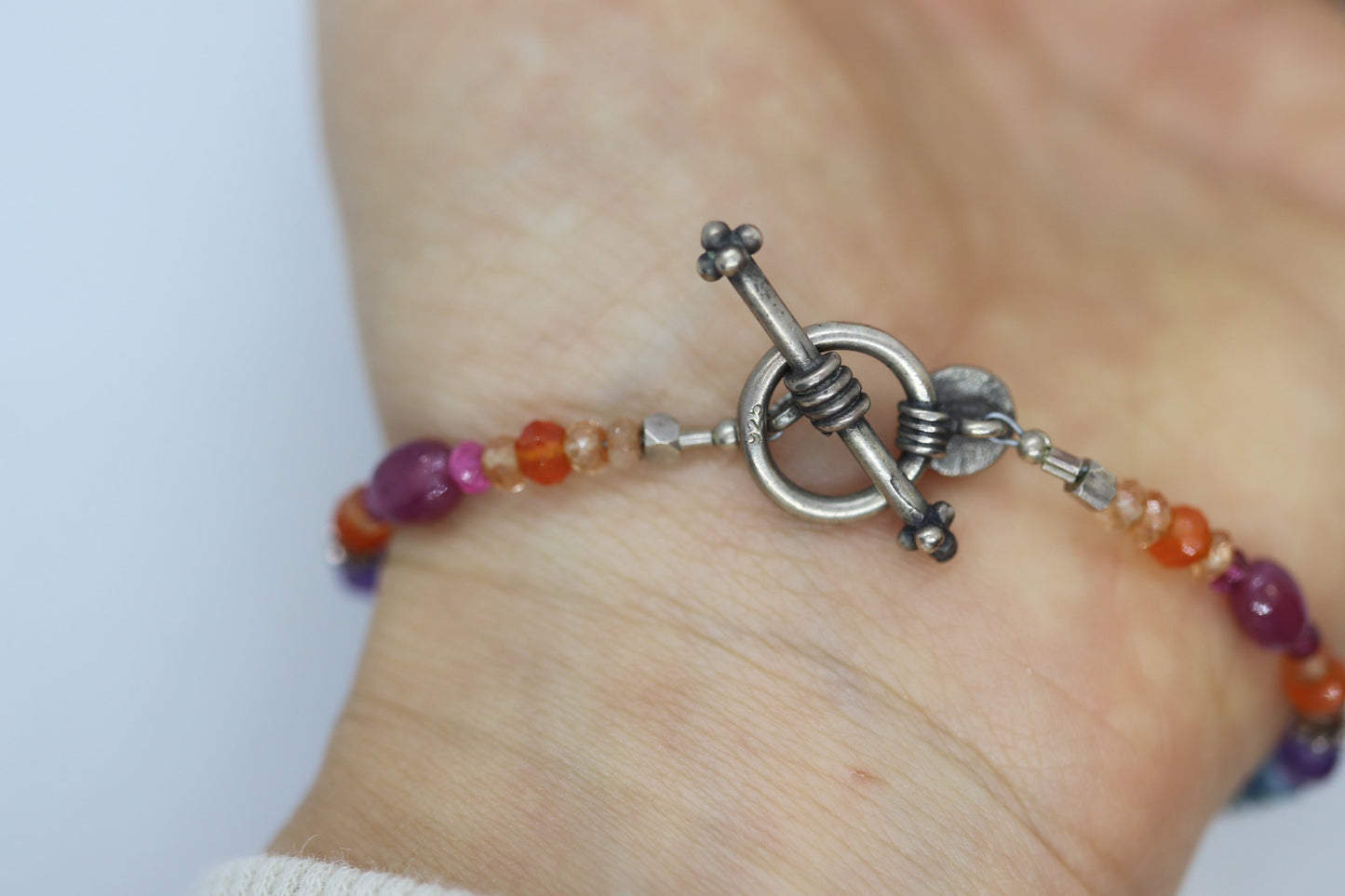 Laura Gibson Bracelet. Sterling Silver with Dangling Faceted Gems - Carnelian Amethyst Tourmaline (299)