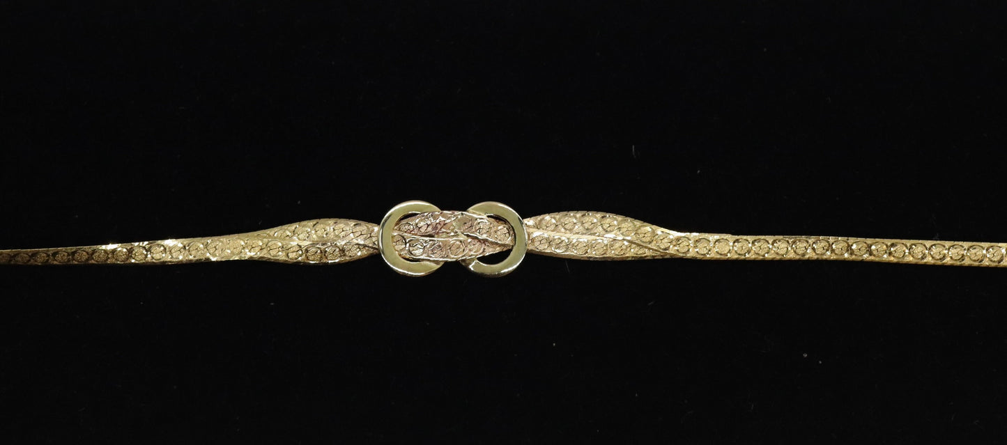 Twisted herringbone bracelet. 14k Reversible high polish bracelet