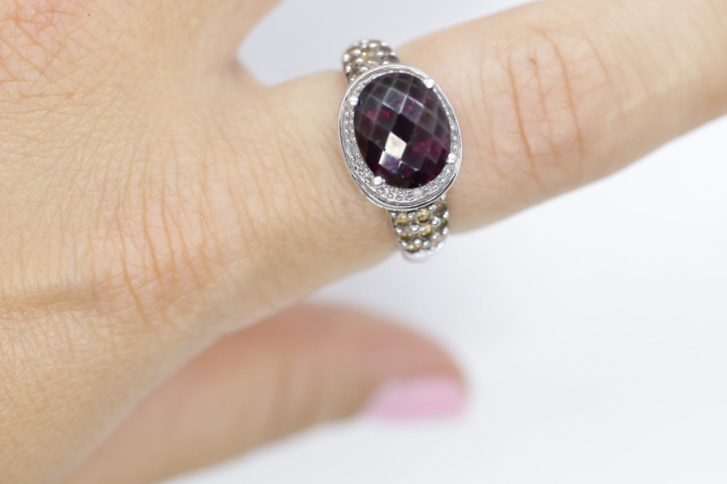 14k Large Faceted Garnet solitaire ring with champagne diamonds. (117)
