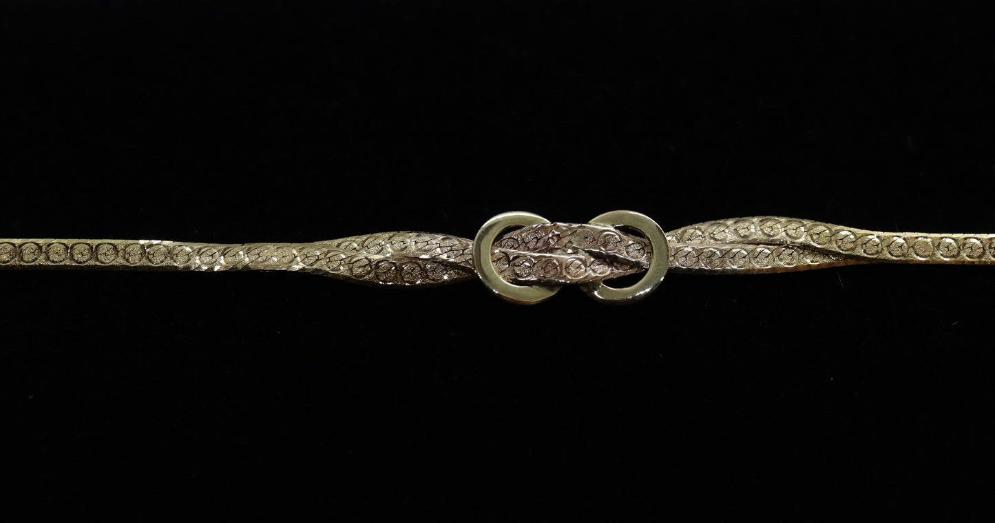 Twisted herringbone bracelet. 14k Reversible high polish bracelet