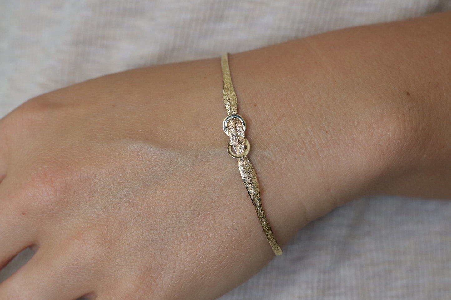 Twisted herringbone bracelet. 14k Reversible high polish bracelet