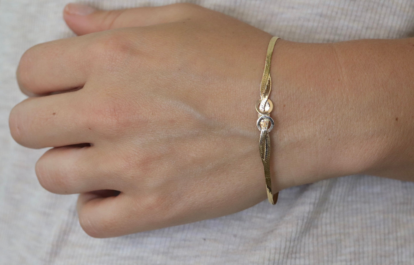 Twisted herringbone bracelet. 14k Reversible high polish bracelet