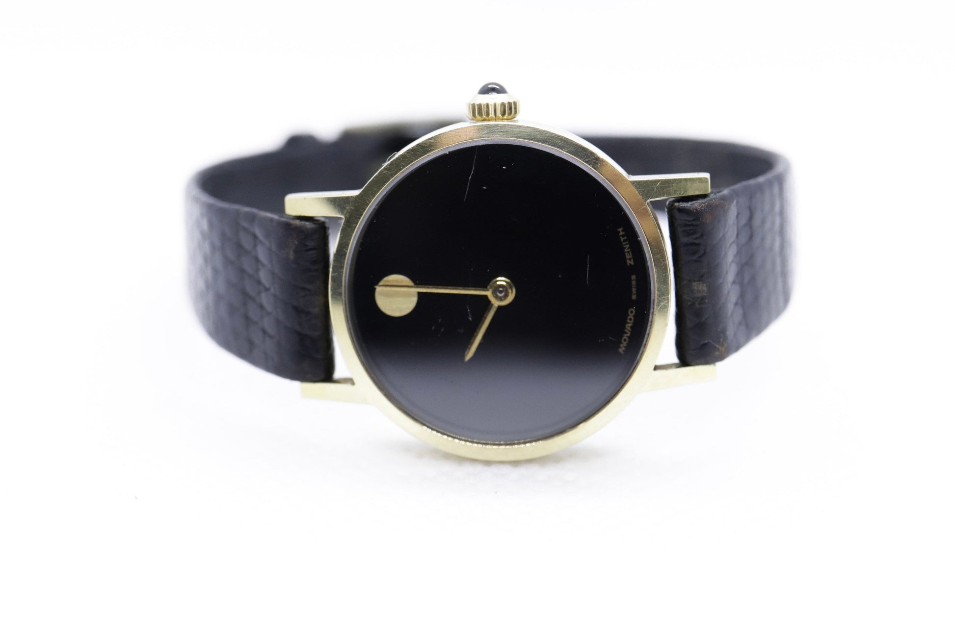 14k MOVADO Zenith Round Mechanical Watch. Movado Vintage Ladies watch with black leather band st(124/85)