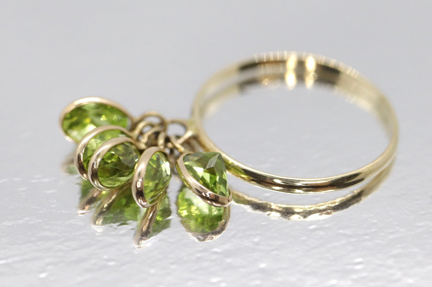 10k Peridot Dangle Charm ring. 10k Gem dangle ring