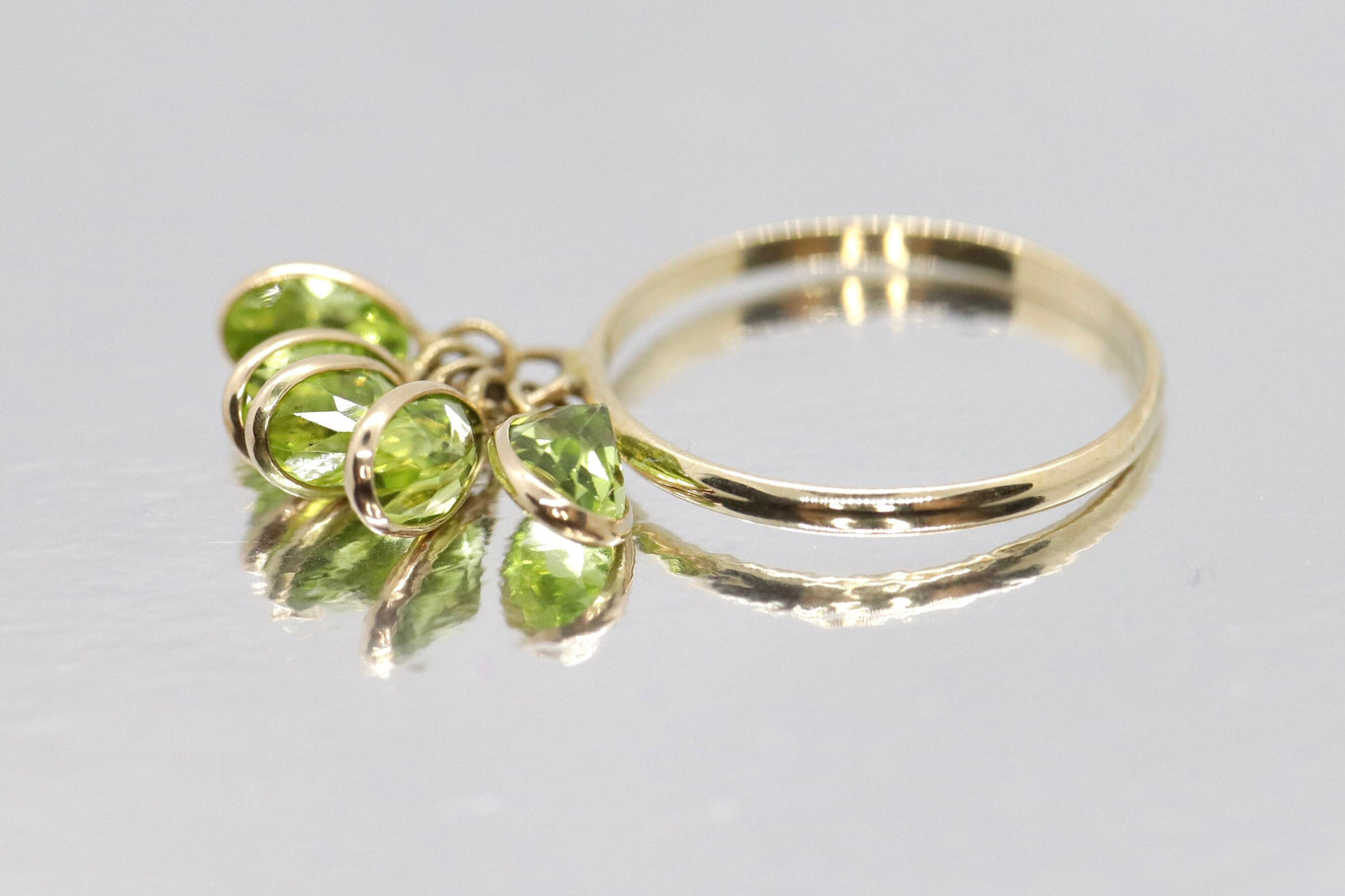10k Peridot Dangle Charm ring. 10k Gem dangle ring