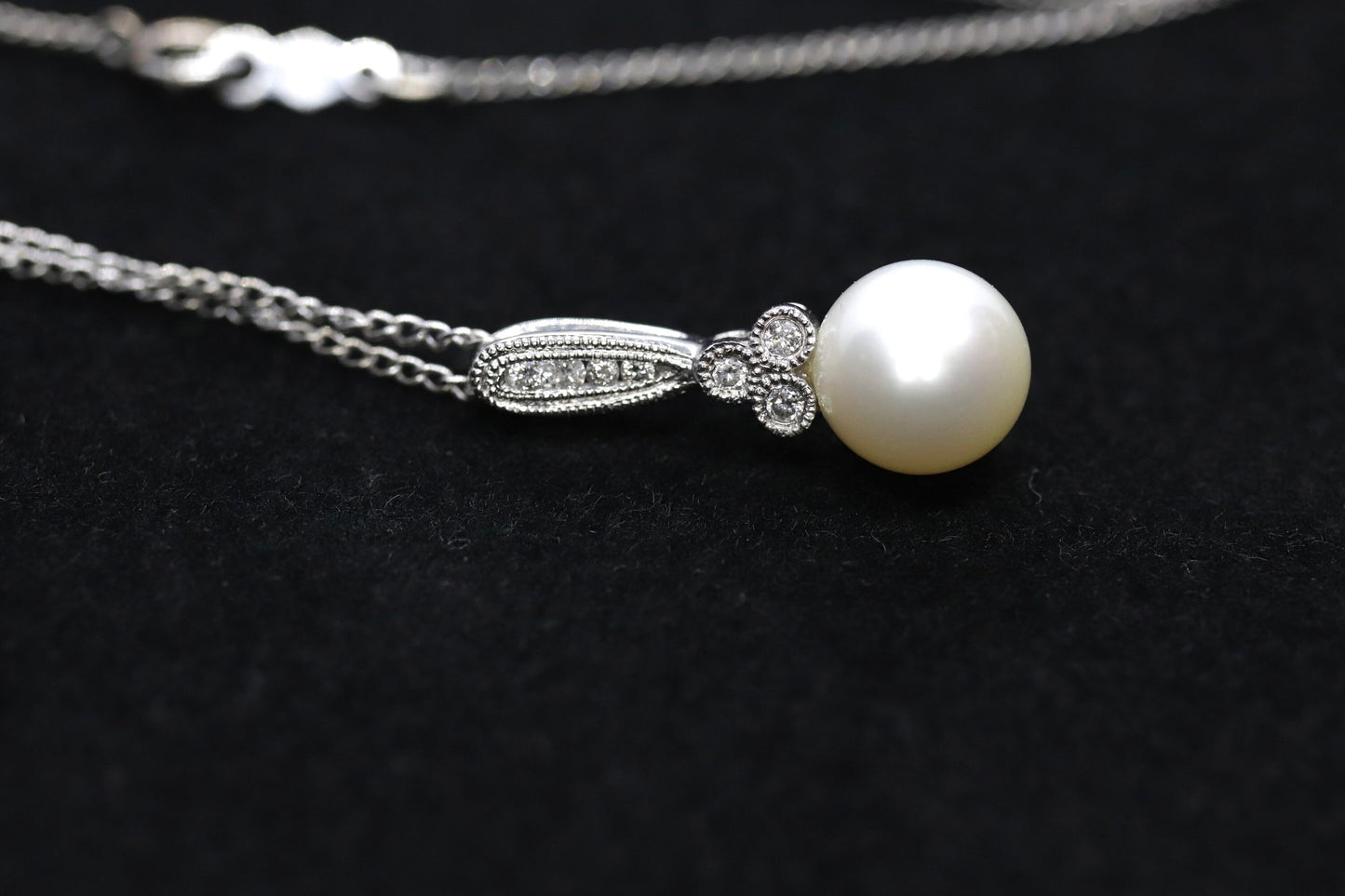 Pearl diamond pendant and necklace. 10k Dangle Pearl pendant with cable necklace (14)(00.90)