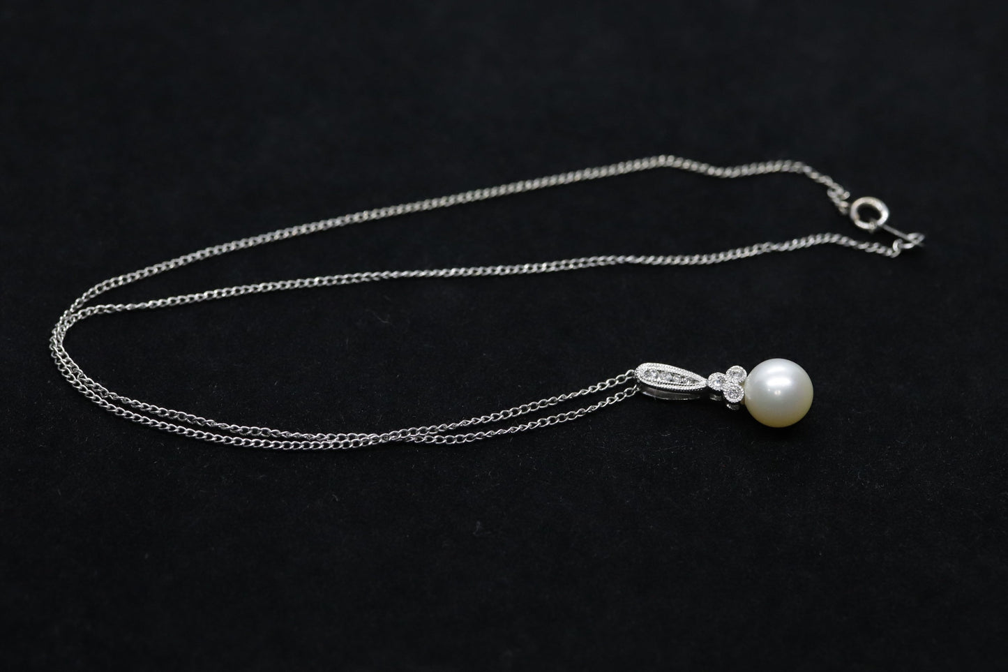 Pearl diamond pendant and necklace. 10k Dangle Pearl pendant with cable necklace (14)(00.90)