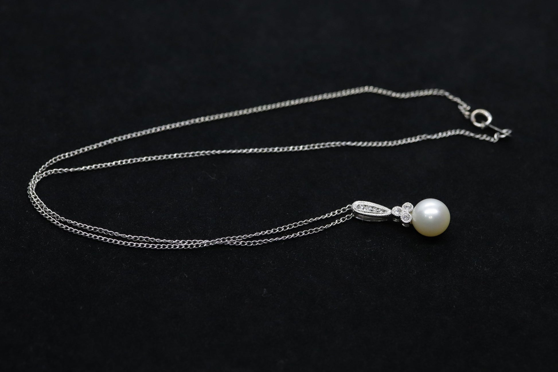 Pearl diamond pendant and necklace. 10k Dangle Pearl pendant with cable necklace (14)(00.90)
