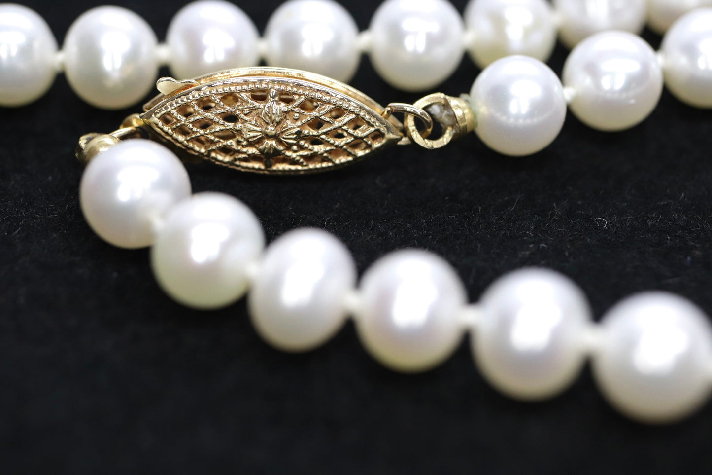 14k Pearl Necklace. 16in length 6mm freshwater pearls