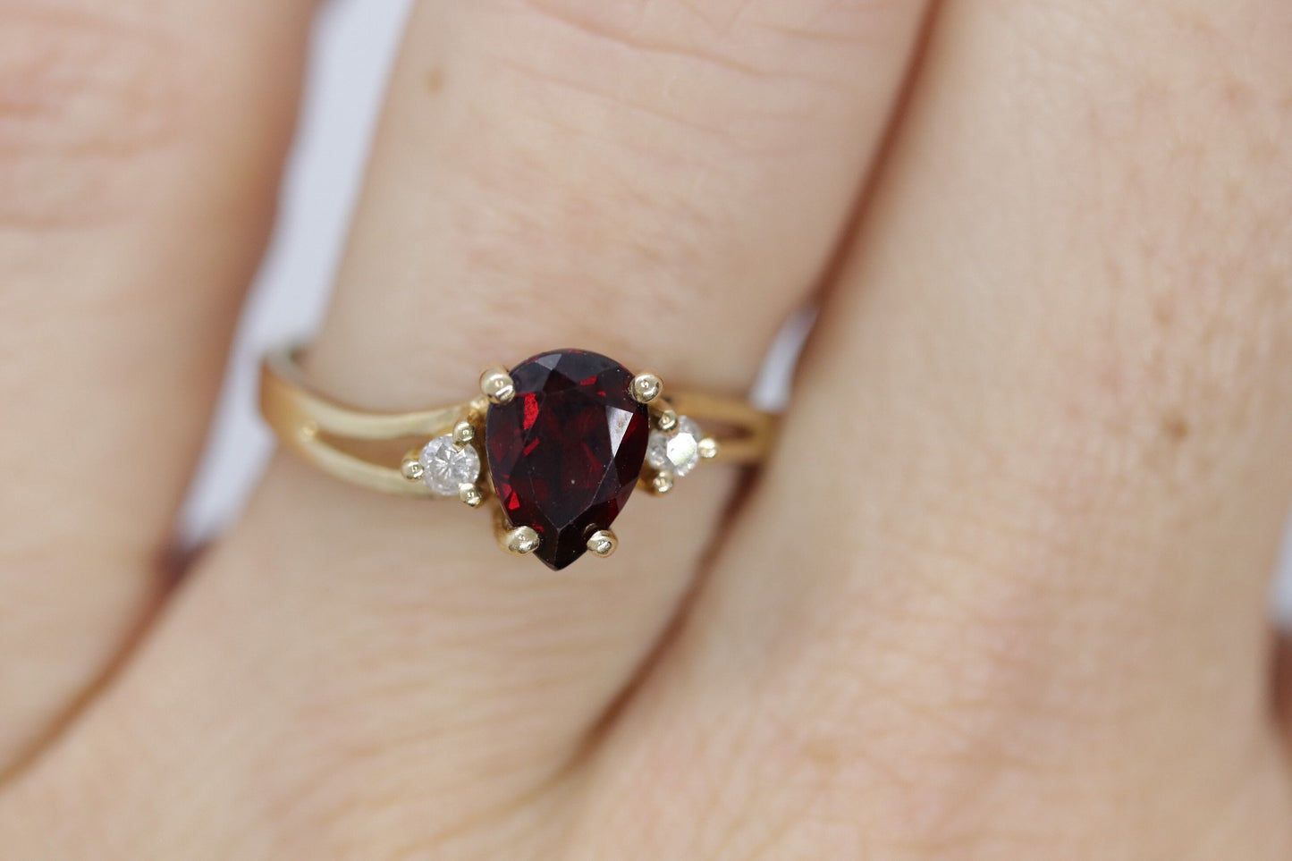 14k Pear Garnet and diamond ring. 14k Pear cut garnet with diamonds solitaire