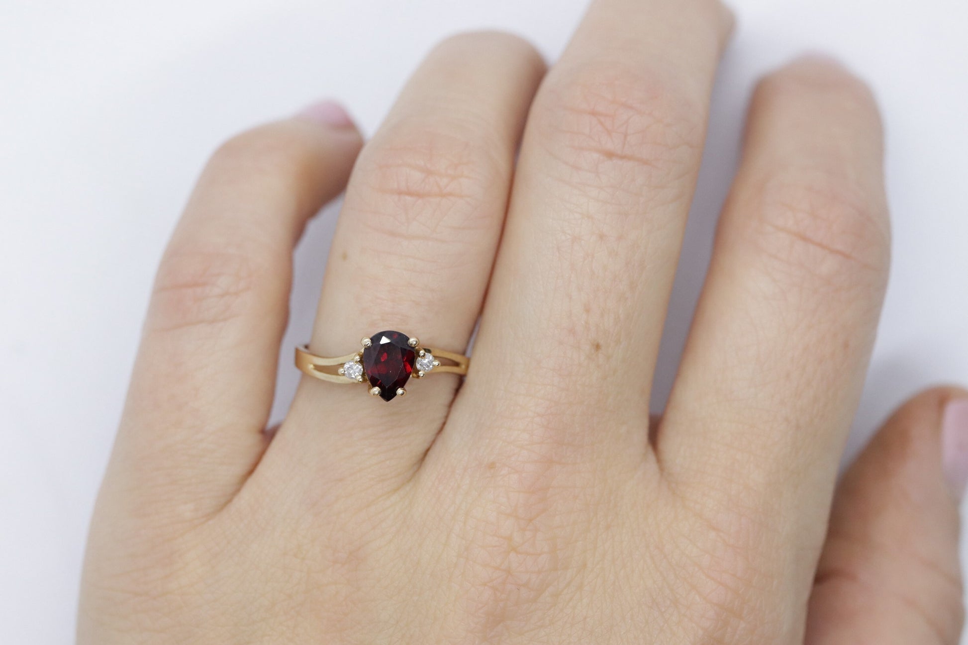 14k Pear Garnet and diamond ring. 14k Pear cut garnet with diamonds solitaire