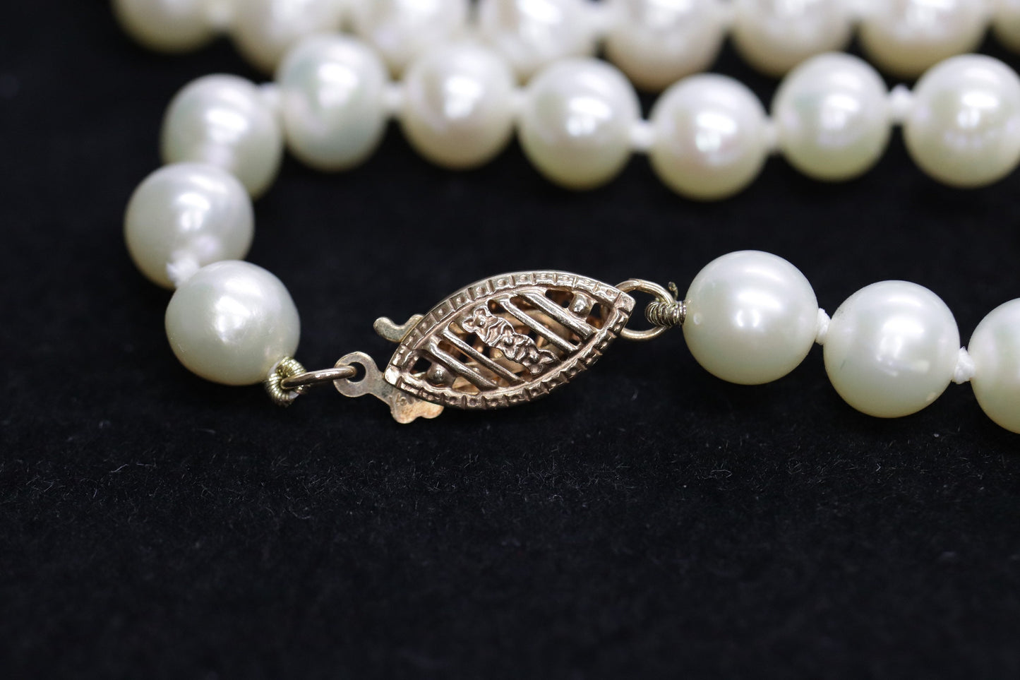 14k Pearl Necklace. 18in length 6.5mm freshwater pearls