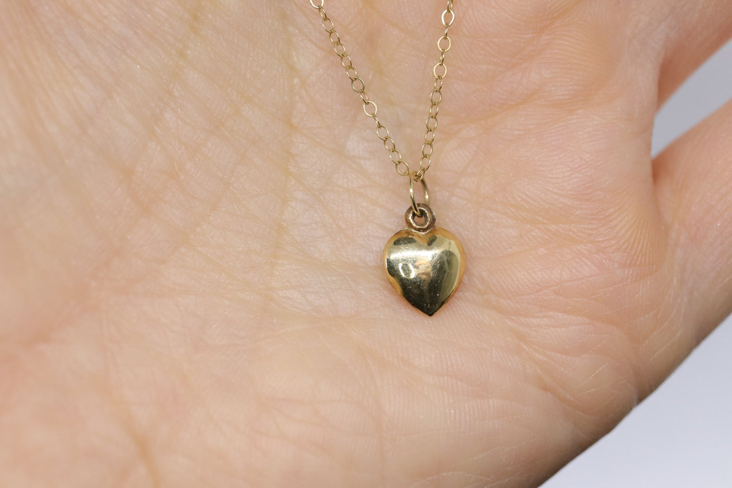 14k Puffed Heart Pendant. 14k Cable chain necklace. 1mm wide 15in length