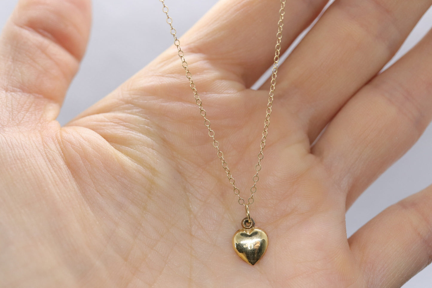14k Puffed Heart Pendant. 14k Cable chain necklace. 1mm wide 15in length
