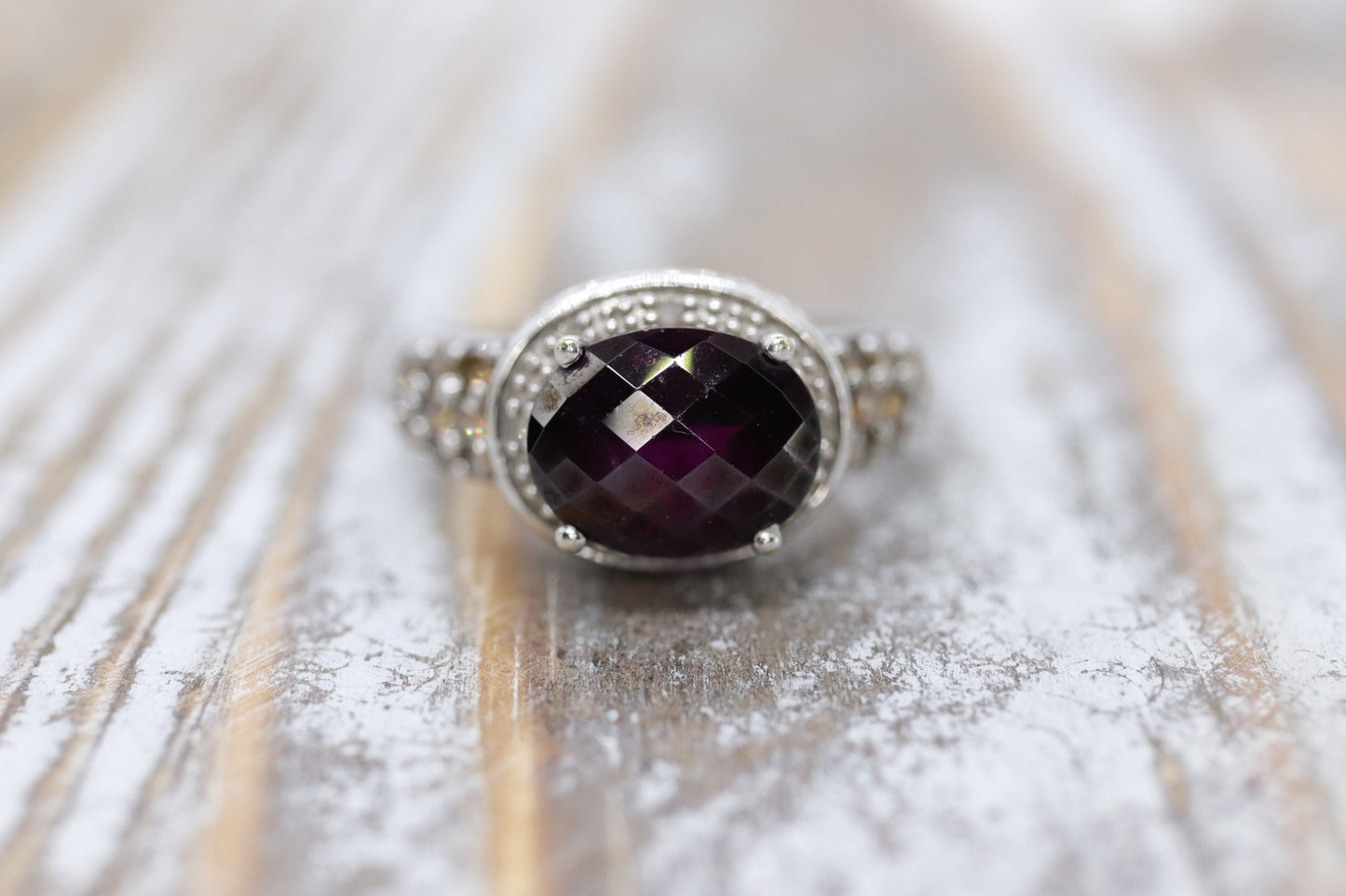 14k Large Faceted Garnet solitaire ring with champagne diamonds. (117)