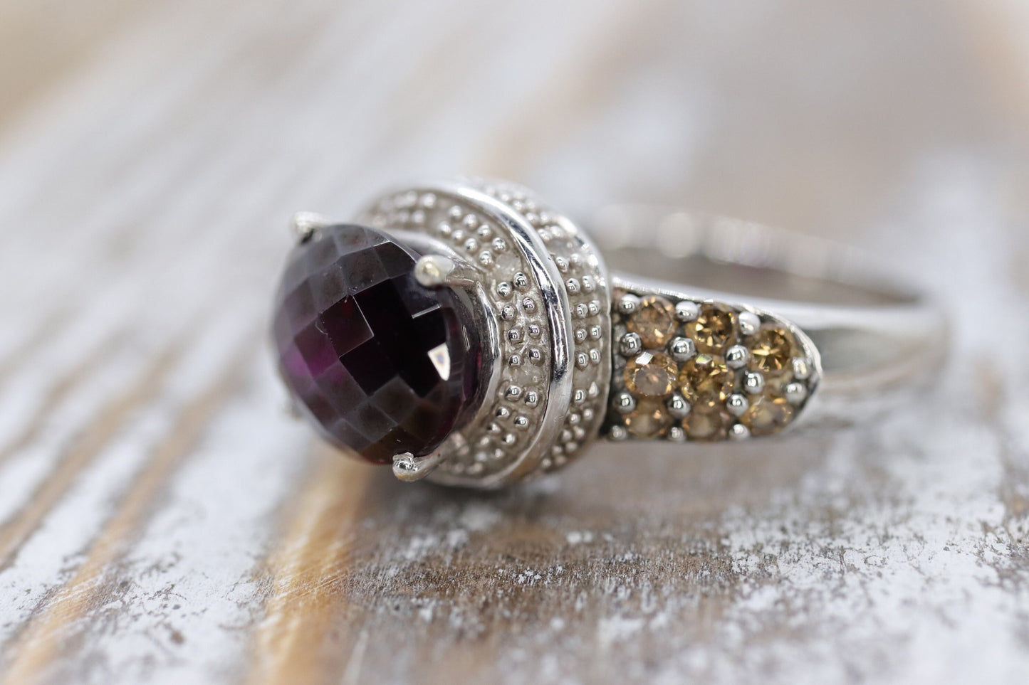14k Large Faceted Garnet solitaire ring with champagne diamonds. (117)