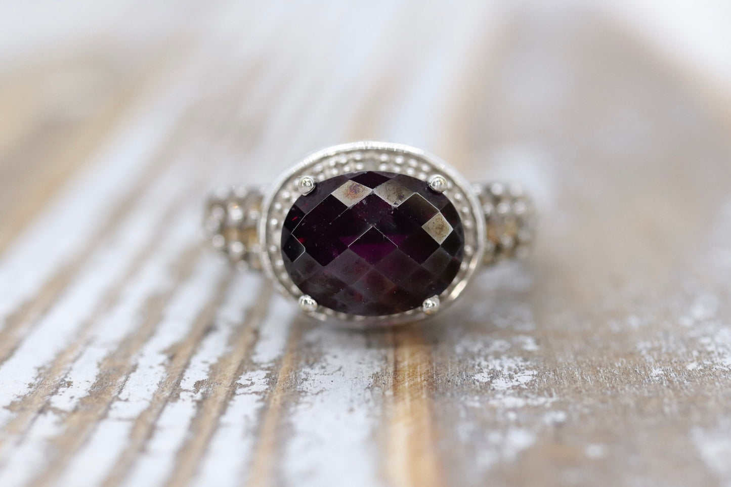 14k Large Faceted Garnet solitaire ring with champagne diamonds. (117)