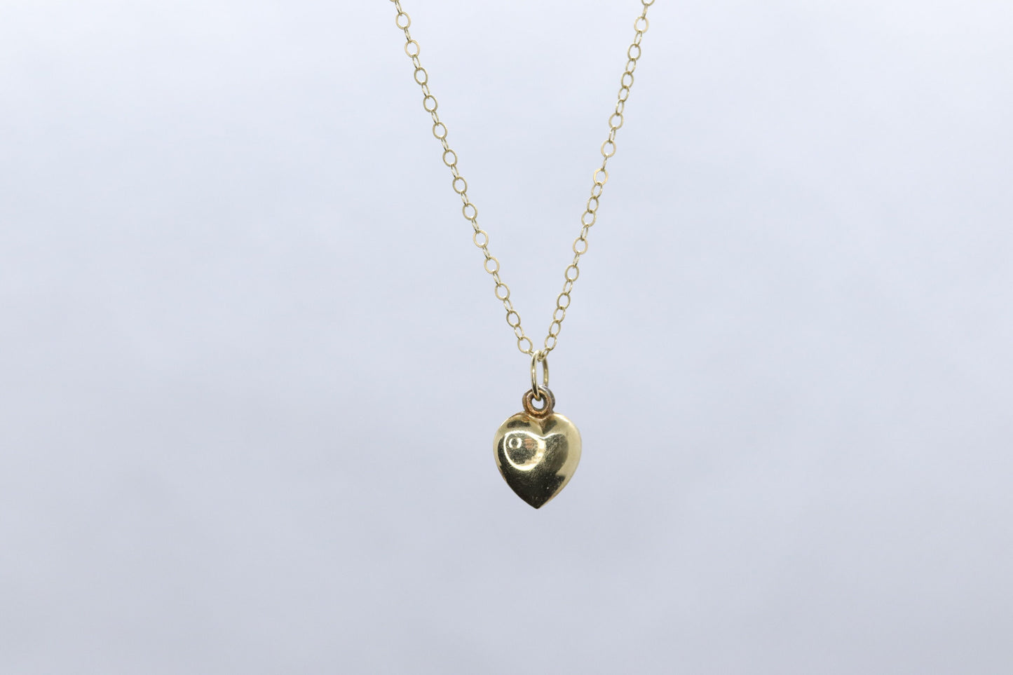 14k Puffed Heart Pendant. 14k Cable chain necklace. 1mm wide 15in length