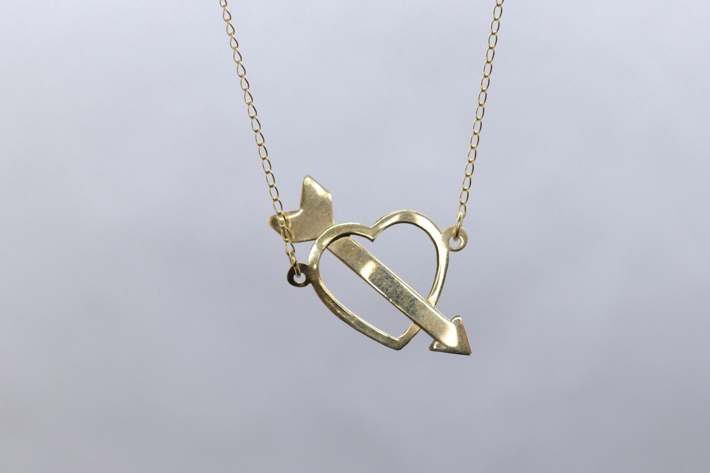 14k Open Heart Pendant. 14k Pierced Heart Arrow Cable chain necklace. 1mm wide 15in length