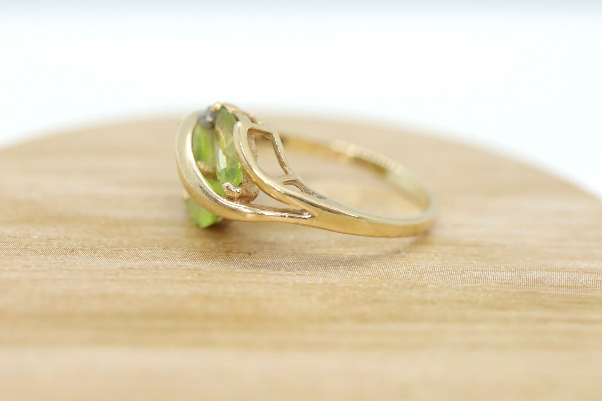 10k Peridot Marquise Leaf Motif Cluster ring. Peridot diamond ring.