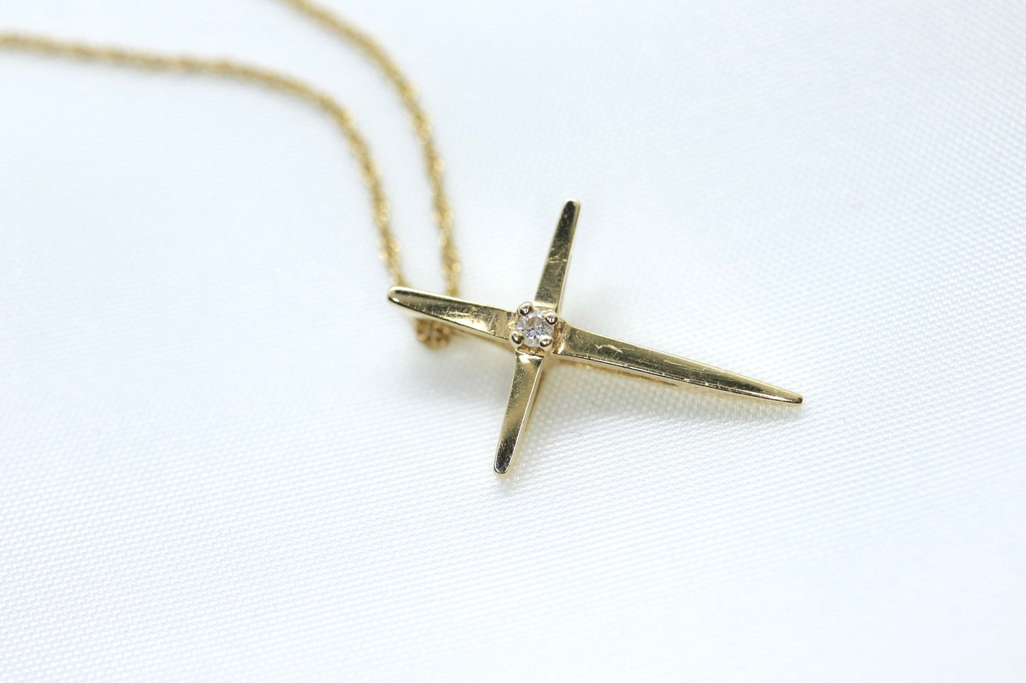 14k Diamond cross. 14k Yellow gold crucifix with twisted rope necklace chain