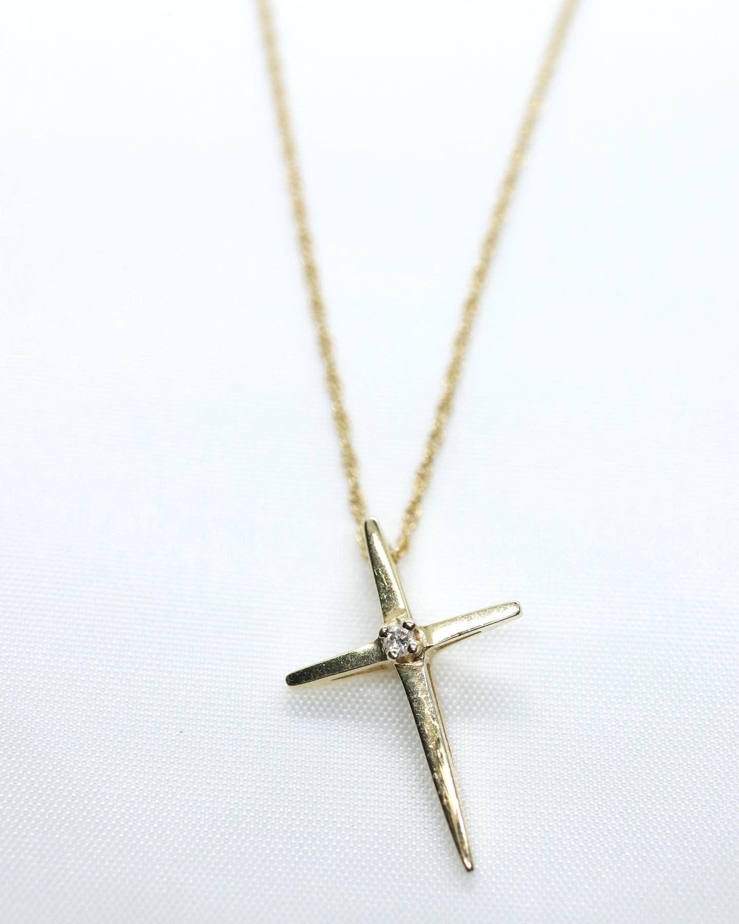 14k Diamond cross. 14k Yellow gold crucifix with twisted rope necklace chain