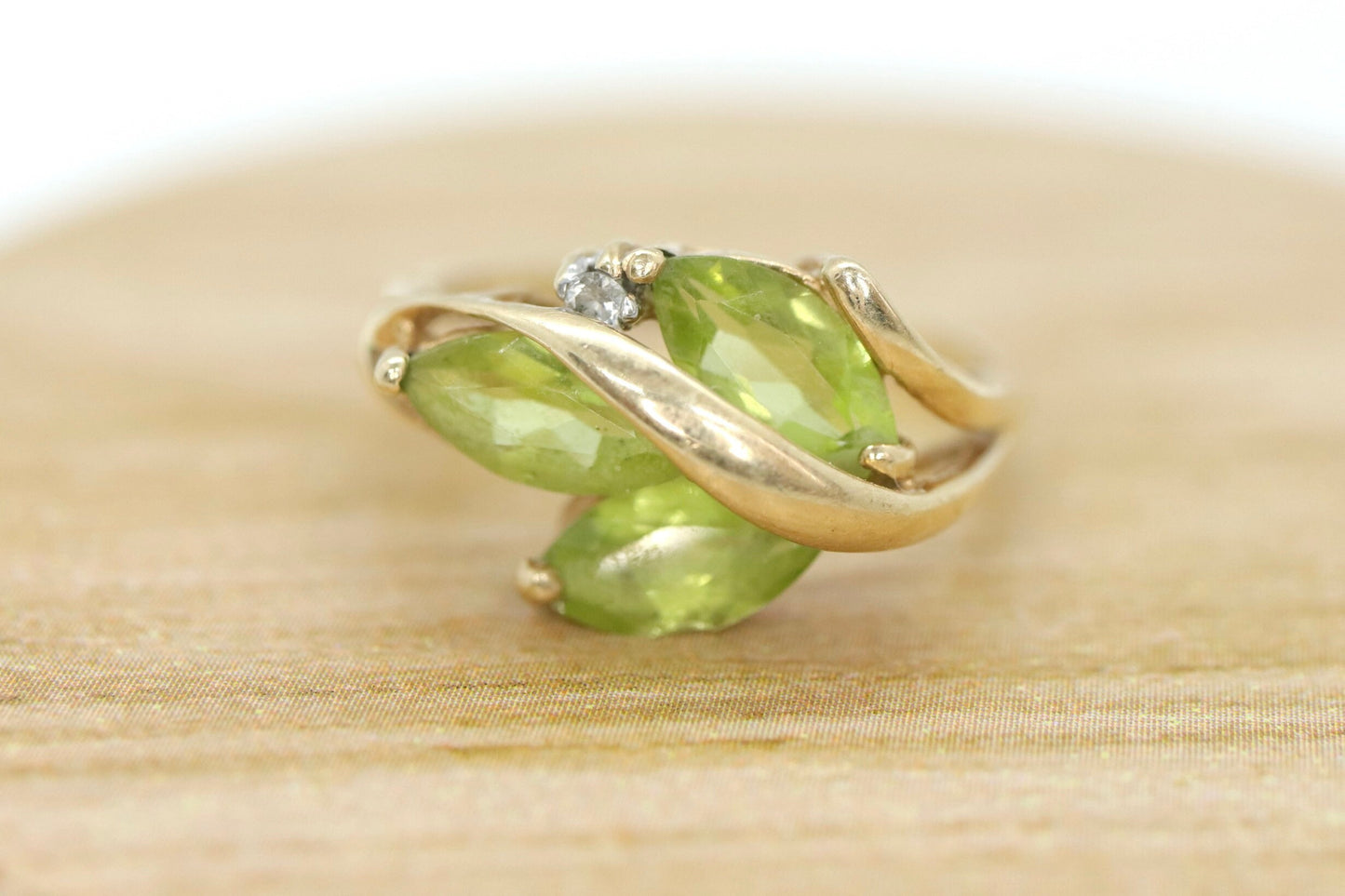 10k Peridot Marquise Leaf Motif Cluster ring. Peridot diamond ring.