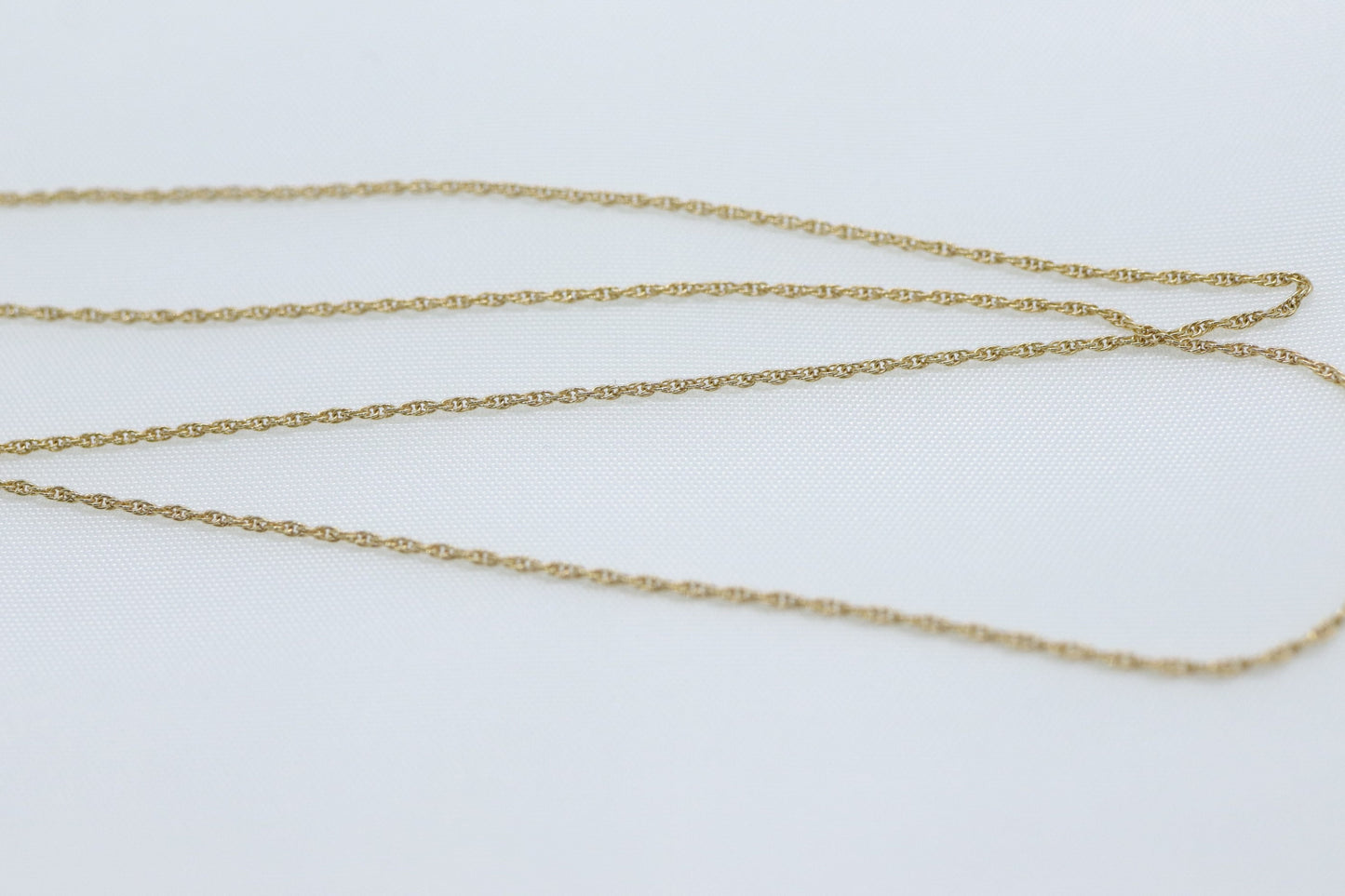 14k Diamond cross. 14k Yellow gold crucifix with twisted rope necklace chain