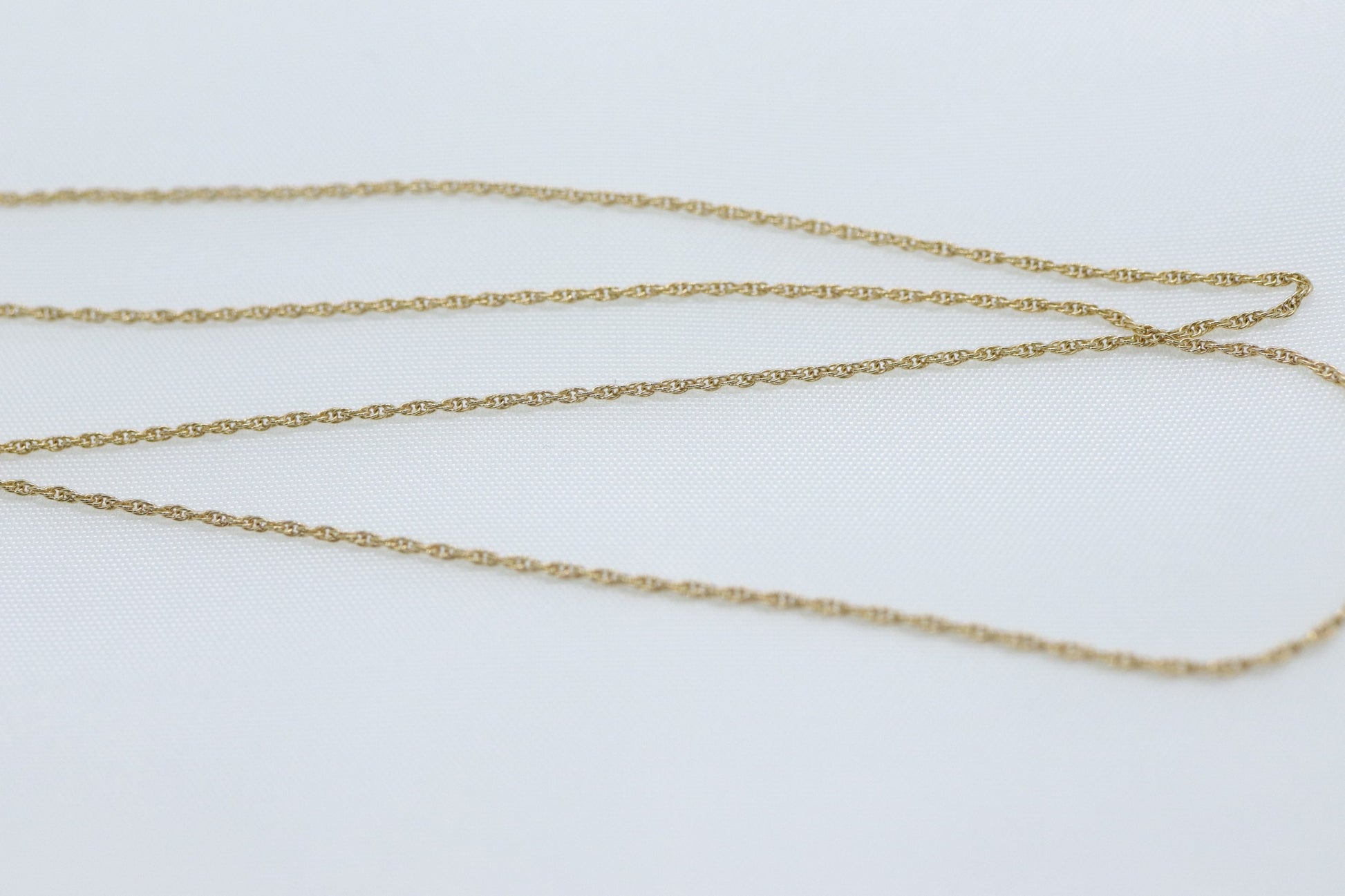 14k  Diamond cross. 14k Yellow gold crucifix with twisted rope necklace chain