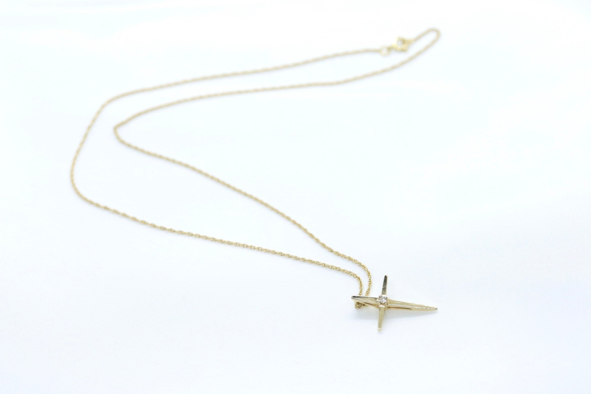 14k  Diamond cross. 14k Yellow gold crucifix with twisted rope necklace chain