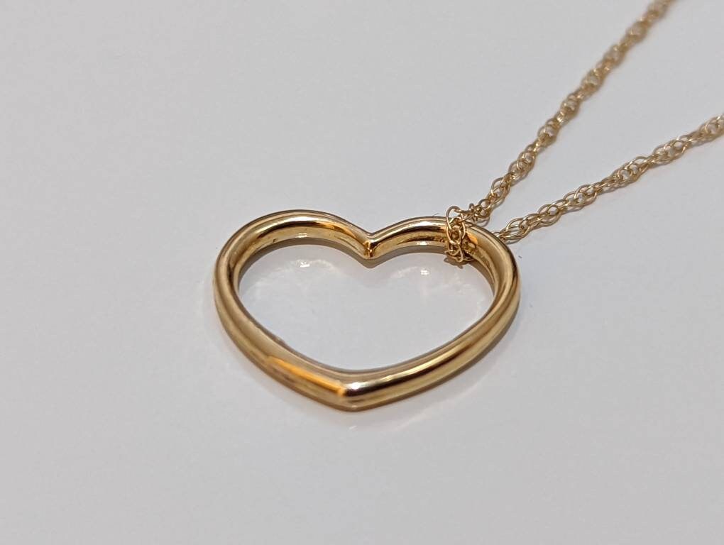 14k Open Heart Pendant. 14k Rope chain necklace. 1mm wide 18in length. Jacmel JCM