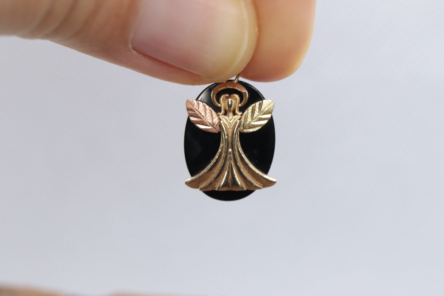 Black Hills Gold Angel Onyx Pendant. 10k multi tone Black Hills Gold Guardian Angel Pendant (58/65)