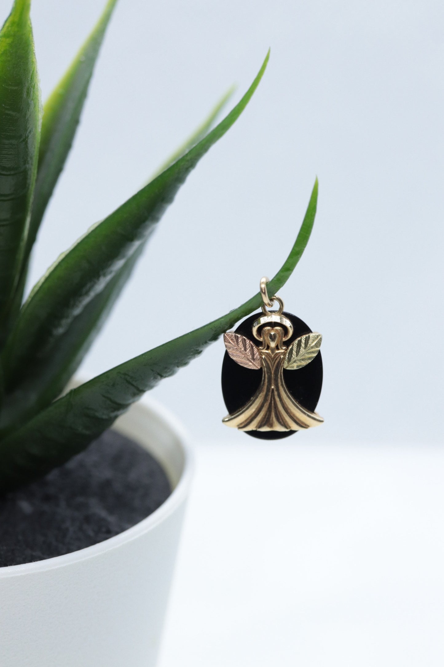 Black Hills Gold Angel Onyx Pendant. 10k multi tone Black Hills Gold Guardian Angel Pendant (58/65)