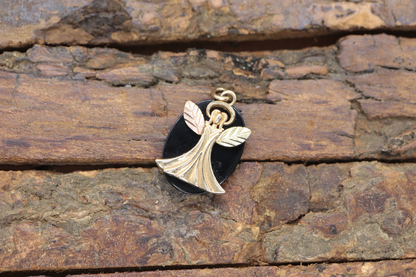 Black Hills Gold Angel Onyx Pendant. 10k multi tone Black Hills Gold Guardian Angel Pendant (58/65)