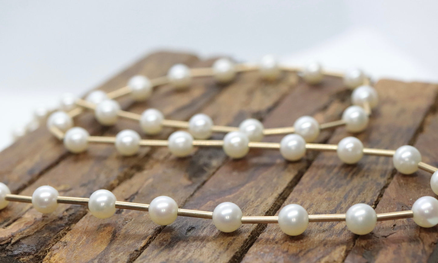 14k Gold Bead and Pearl Necklace. Intermitted Pearl 14k Necklace st(63/25)