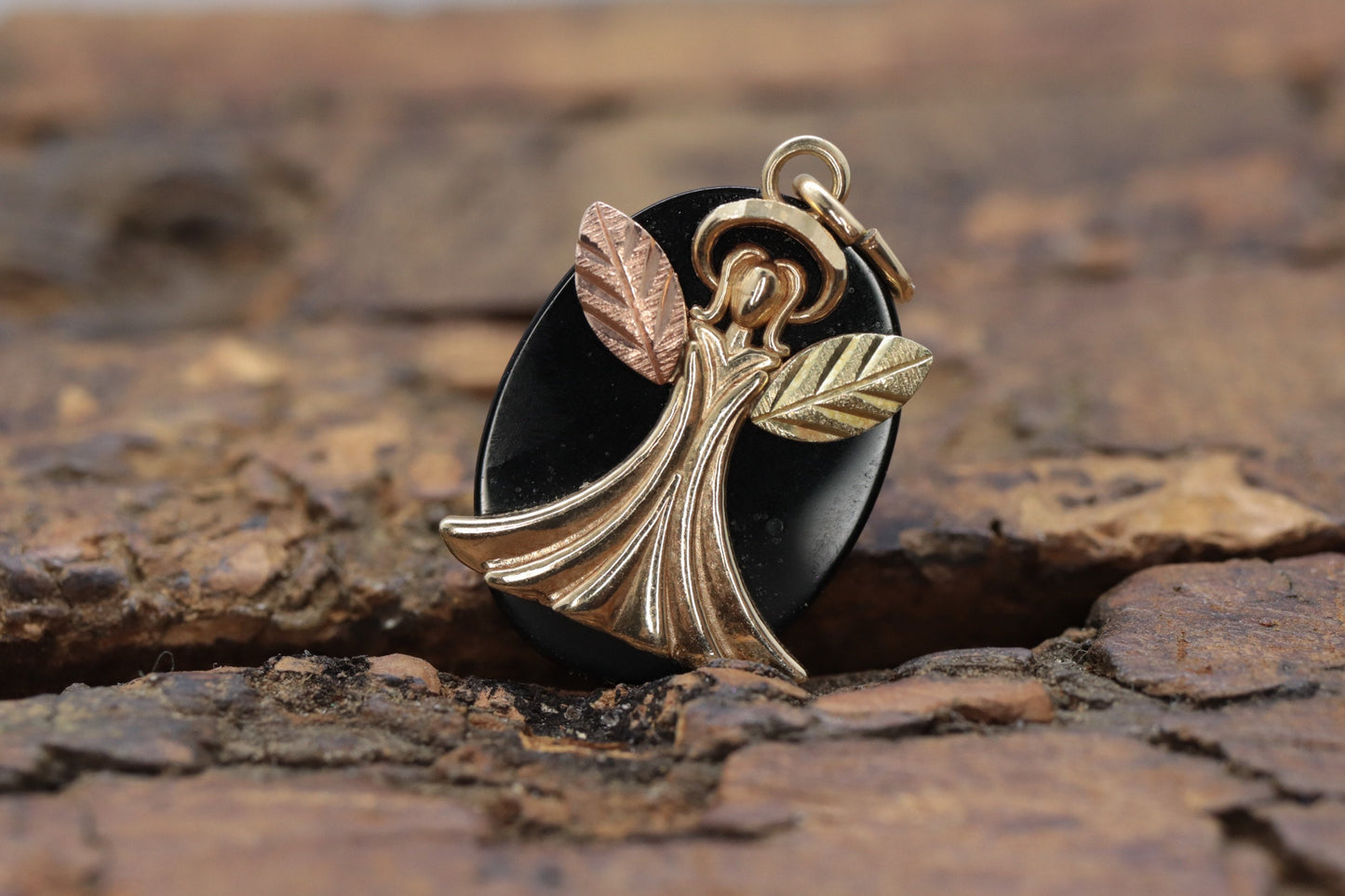 Black Hills Gold Angel Onyx Pendant. 10k multi tone Black Hills Gold Guardian Angel Pendant (58/65)