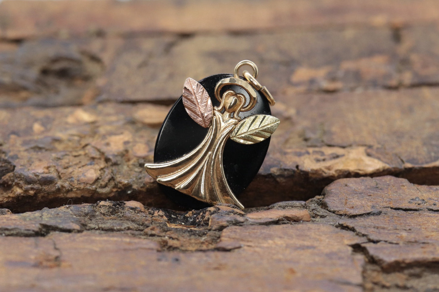 Black Hills Gold Angel Onyx Pendant. 10k multi tone Black Hills Gold Guardian Angel Pendant (58/65)
