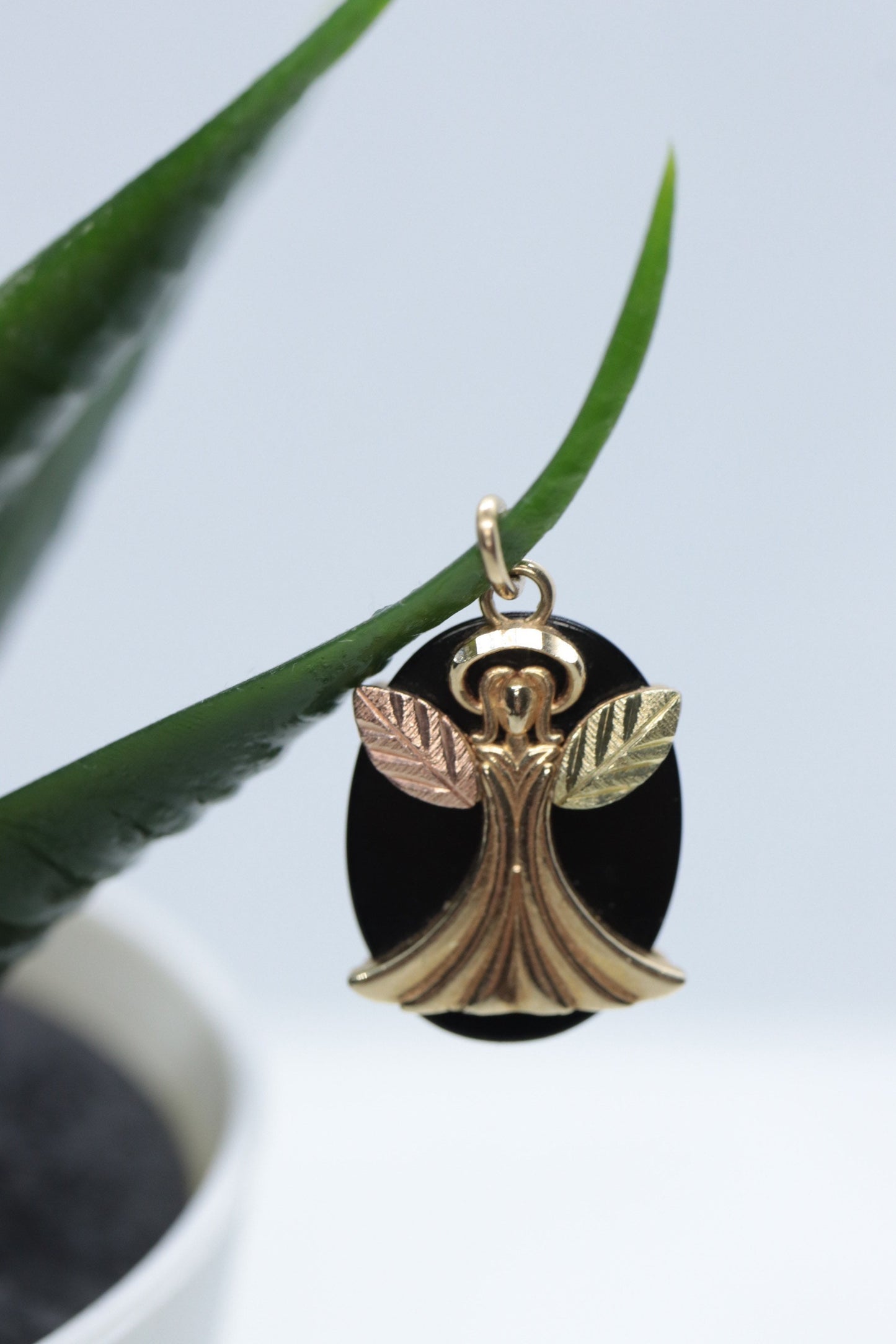 Black Hills Gold Angel Onyx Pendant. 10k multi tone Black Hills Gold Guardian Angel Pendant (58/65)