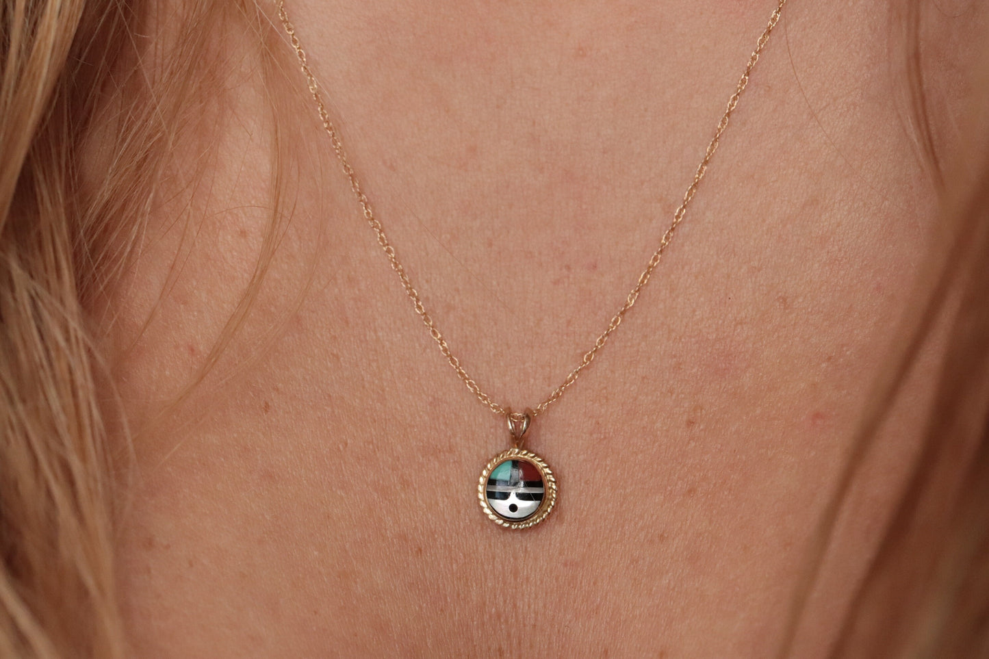 14k Zuni Pendant. Navajo Mop Turquoise Carnelian Inlay in a round canister setting. st(92/00)