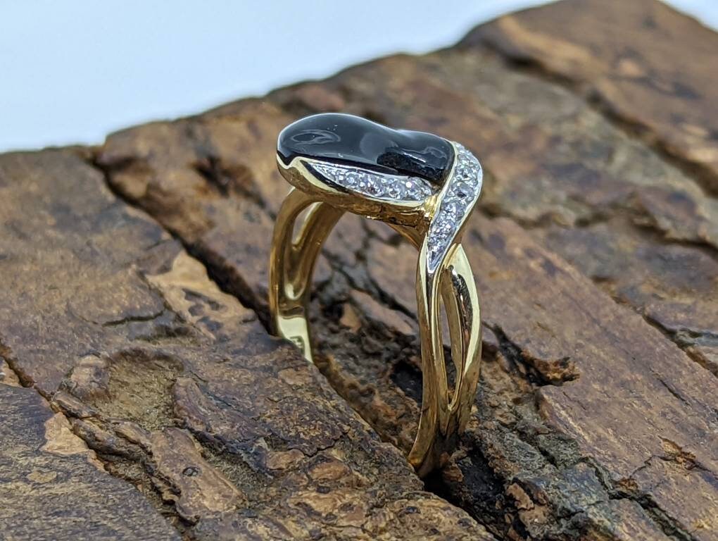 14k Onyx and diamond Band. 14k Curved Oval Disk Onyx and channel set diamond ring. Abstract Onyx ring. st (138/00)
